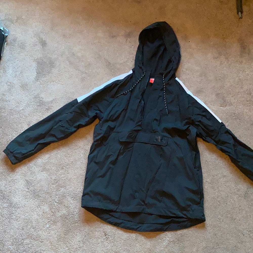 Large black, new balance, windbreaker.